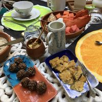Breakfast - tropical fruits, chickpea vegan omelet, nut balls. at Hostal Patio de 27 in Havana