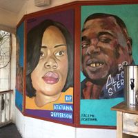 Beautiful murals at outside eating area.  at Namaste Cafe in Minneapolis