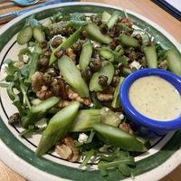 Arugula asparagus walnut salad with a delicious dressing!  at VanGogh's Eeterie in Springfield