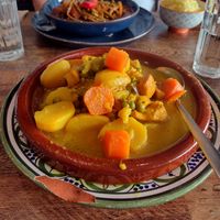 Berber Tagine served with couscous and Lebanese bean stew at Vegetus in Cheltenham
