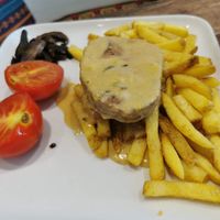 Steak and chips. The cheesy sauce was lovely 😍 at Vegetus in Cheltenham