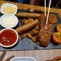 Mixed grill plater and sauces at Vegetus in Cheltenham