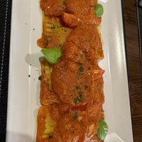 Ravioli alla curcuma ripieni di tofu e spinacih  at Ciriera Osteria Vegan in Trequanda