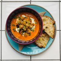 Beautiful seasonal soup red pepper with vegan créeme fraiche at Cliffs in Margate