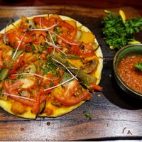 Vegan pumpkin pizza at V's Home in Hanoi