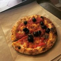 pizza marinara with olives at Trieste Pizza in Rome