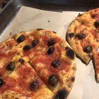 Tomato, olive and rosemary  at Trieste Pizza in Rome