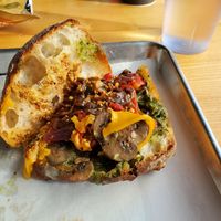 Vegan artichoke sandwich plenty of goodies inside with vegan cheese at Lemon Tree in Boise