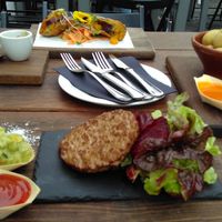 Tacos, Canarian potatoes and (Linda McCartney) burger with salad / dip. at Cantina Teguise in Lanzarote