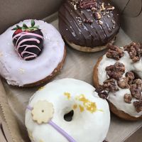 A box I got around Valentine’s Day. My favorite one was the cream filled chocolate turtle donut and my boyfriend loved the Earl grey flavor.   at Strange Matter Coffee - Eastside in Lansing