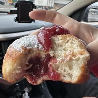 The filled donuts… I’m addicted… strawberry cranberry….  at Strange Matter Coffee - Eastside in Lansing