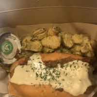 Vegan chili cheese dog with fried pickles and curly fries (in separate box)  at The Dogfather in San Antonio