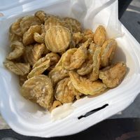 Half order of fried pickles. Ask for vegan ranch!   at The Dogfather in San Antonio