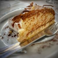 Torta delizia: pan di Spagna con farcia di arachidi salate e copertura di cioccolato fondente  at Hotel Ristorante Onda Azzurra in Albisola Superiore
