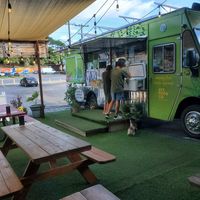 Cute outdoor seating with large fans to help cool you off at ATX Food Co in Austin