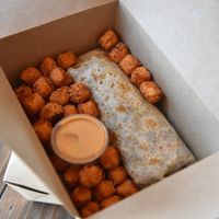Breakfast Burrito with sweet potato tots at Vida Eatery  in Bakersfield