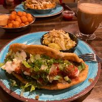 Native taco with mac’n’cheese, Mexican chocolate, sweet potato tots, garlic aioli fries (background)  at Vida Eatery  in Bakersfield