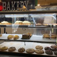 Bakery case, we got a cinnamon roll to-go 😜  at Vida Eatery  in Bakersfield