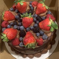 Delicious 8” Chocolate Cake with Chocolate Frosting and Mixed Berries - Was a hit!  at Vida Eatery  in Bakersfield