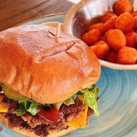 Vida beyond burger w/ sweet potato tots  at Vida Eatery  in Bakersfield