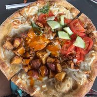 Buffalo/Thai mixed vegan pizza with tempeh! Vegan cheese is great! Amazing crust too 😍 at Mellow Mushroom in Lutz