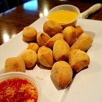 Pretzel bites are vegan with no cheese and butter! Ask for a side of marinara, but ask for that also without cheese (I didn't know it came with it, sigh).  at Mellow Mushroom in Lutz
