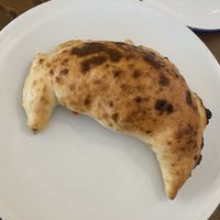 Vegan caltzone  at HaPizza in Tel Aviv