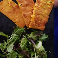 Fritatta (made with zucchini and chickpea flour) and salad... With a dip or dressing would be perfect!!! at Veg Joy in Rome