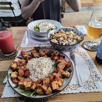 Sweet and sour tofu, Caesar salad, courgette spaghetti with cashew sauce at Veg Joy in Rome