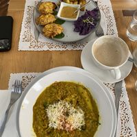 Crispy tofu main and basmati rice with seasonal vegetables prima  at Veg Joy in Rome