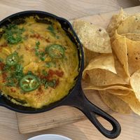 Vegan nacho cheese and chips at Vegolution in Saint John