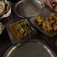 Two vegan curries, onion something for starter, little salad and Roti   at Mahek in Mahe