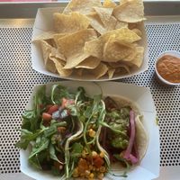 Their three vegan taco order with chips and a garlic sauce. at Screaming Goat in Sarasota