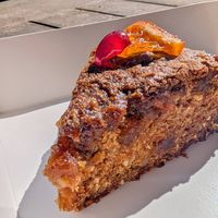 Tropical ginger and macadamia cake (vegan). April 2026 at Johnny Baker in Castlemaine