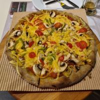 Green pizza at Mystic Pizza - Exarchia in Athens
