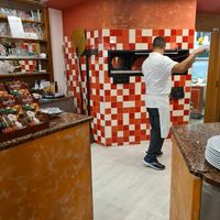 Beautiful big pizza oven visible from inside the restaurant at Time Out Pizzeria in La Bella-ligonto