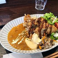 Delicious curry with extra cheese and katsu at Raku Robi Kitchen in Naha