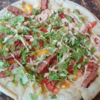 Big Mac Pizza with beyond meat & fyh cheese at Betty's in Buffalo