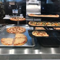 Variety of vegan pizza choices  at Kustom Pizza & Subs in Wheaton