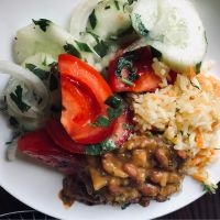 Kidney beans, rice with vegetables, tomato and cucumber salad at Cafe Panorama in Mestia