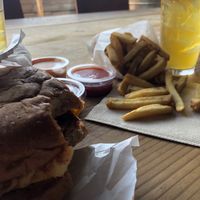 Campfire burger, fries, iced green tea  at The Buzz Mill in Austin