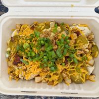 The Gloria with potatoes. at Biscuits + Groovy - Food Trailer Barton Springs in Austin