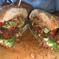 Bean burger cut in half at Manna 68 in Gdansk