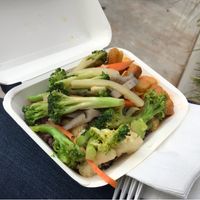 Red rice cooked with coconut milk, veges and curry tofu at Vegan for Longevity & Health in Auckland