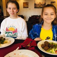 Happy kids with falafel platters! at Al Rayan Restaurant & Market in Murfreesboro