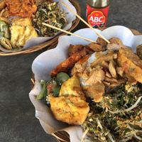2 plates of nasi campur which cost just 17,500 IDR each and ABC kecup manis  at Waikuntha - Warveg Warung Vegetarian in 