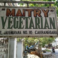 Street sign for the restaurant at Maitry in 