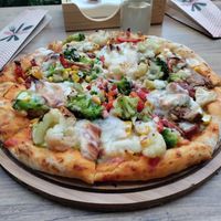 Veg pizza with lots of topping at Vegan House in Antalya