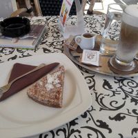 Coconut raw cake and coffee with soy milk at Kavarna in slaščičarna Nabucco in Gornja Radgona