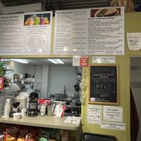 The back counter in the store, the menu is above    at Natural Juice Bar & Vegetarian Eats in Timonium